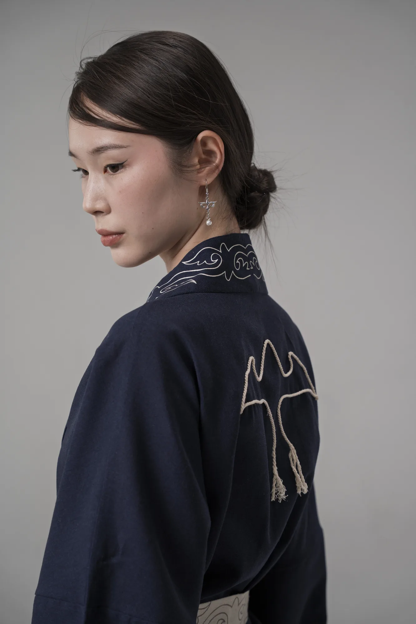Toolor lookbook 2026 — embroidered bird jacket